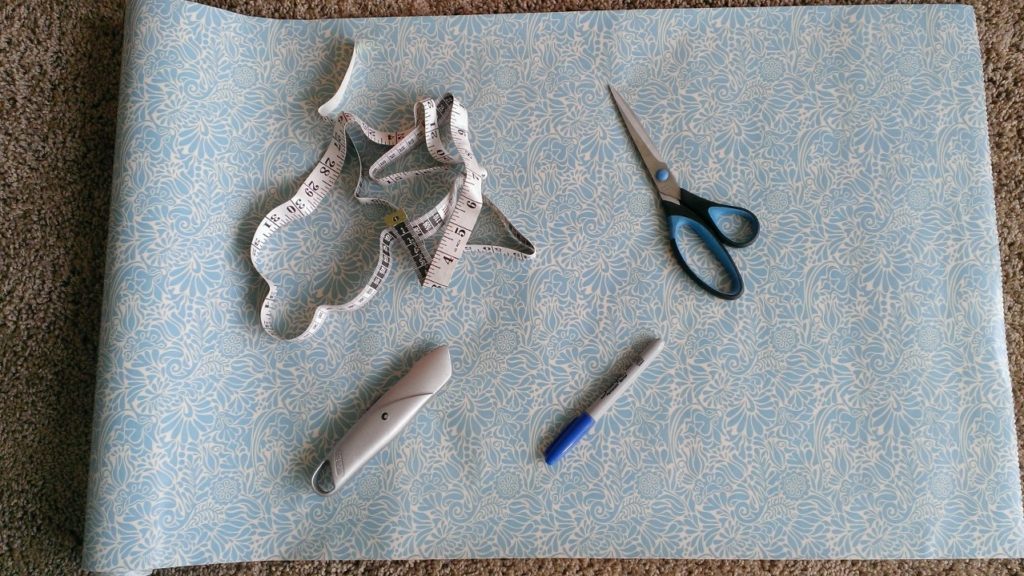 tools, scissors, measuring tape, box cutter, sharpie, contact paper